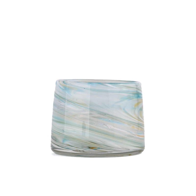 iridescent glass candle jars with coloring material 