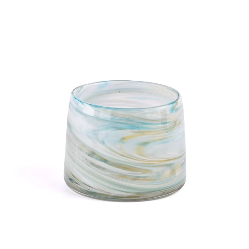 iridescent glass candle jars with coloring material 