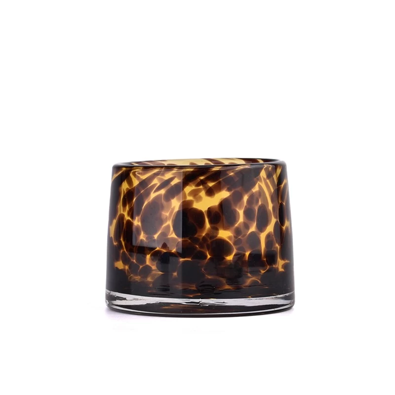 iridescent glass candle jars with coloring material 