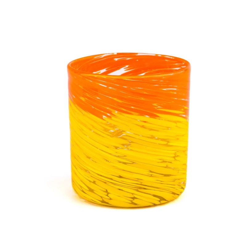 Cina Grosir toples lilin kaca yang dilukis dengan tangan dengan pola kuning dan oranye pabrikan