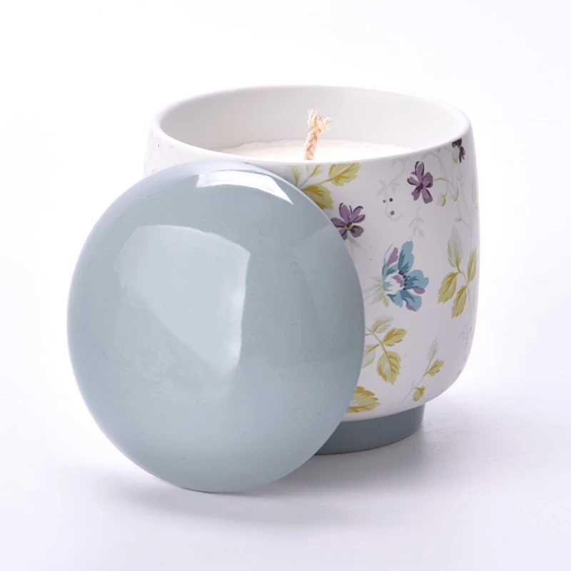 China Frascos de cerâmica para velas com padrão de flor e tampas de vasos de cerâmica fabricante