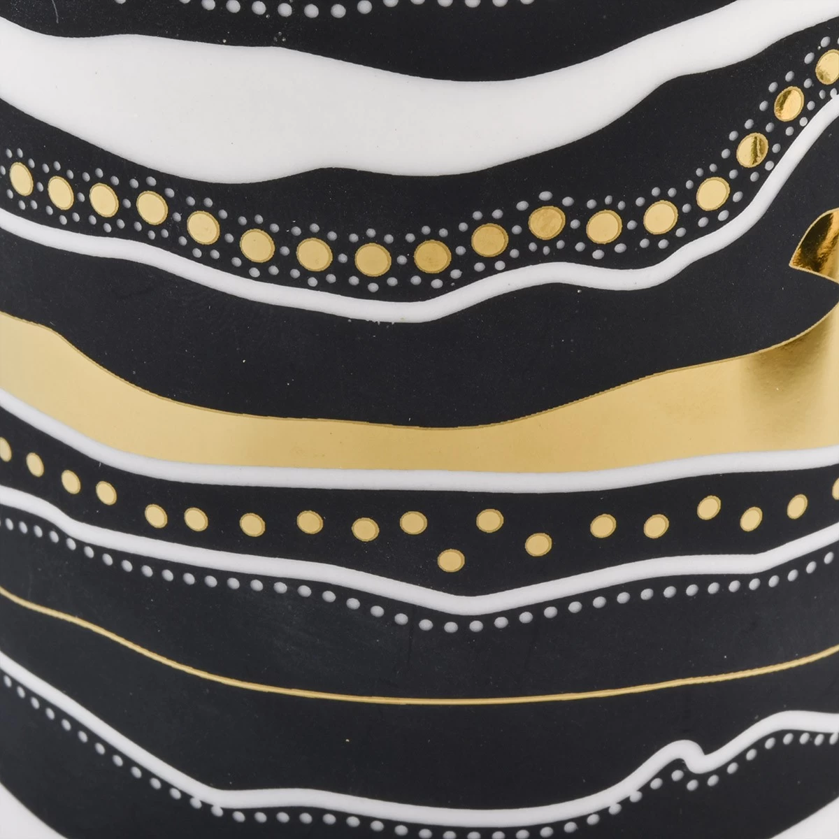 black and gold artwork ceramic candle jar