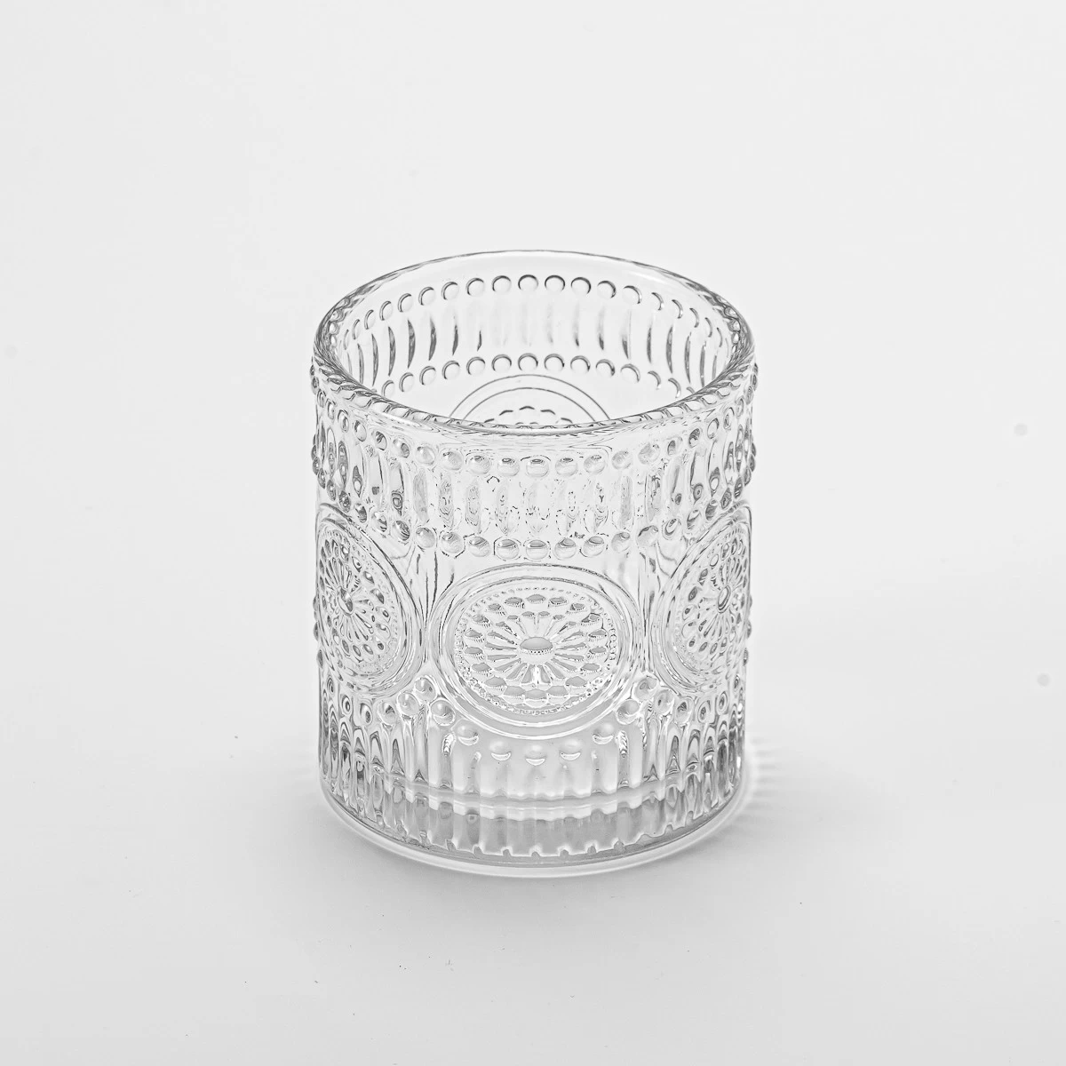 China Custom vintage relief clear glass candle jar for home decor manufacturer