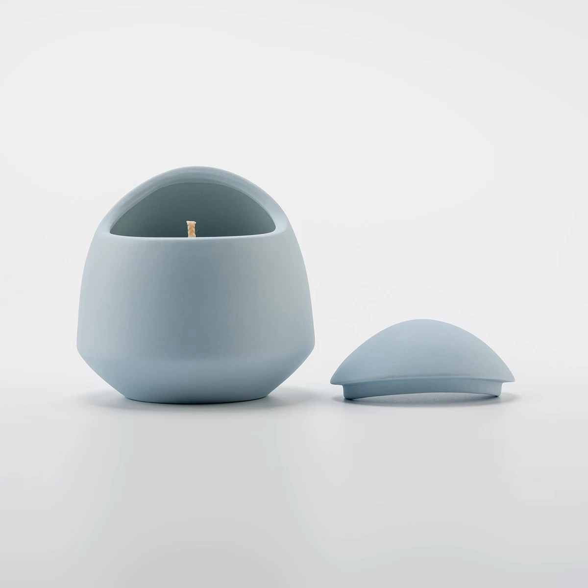 China Egg shape ceramic candle jar home decor manufacturer