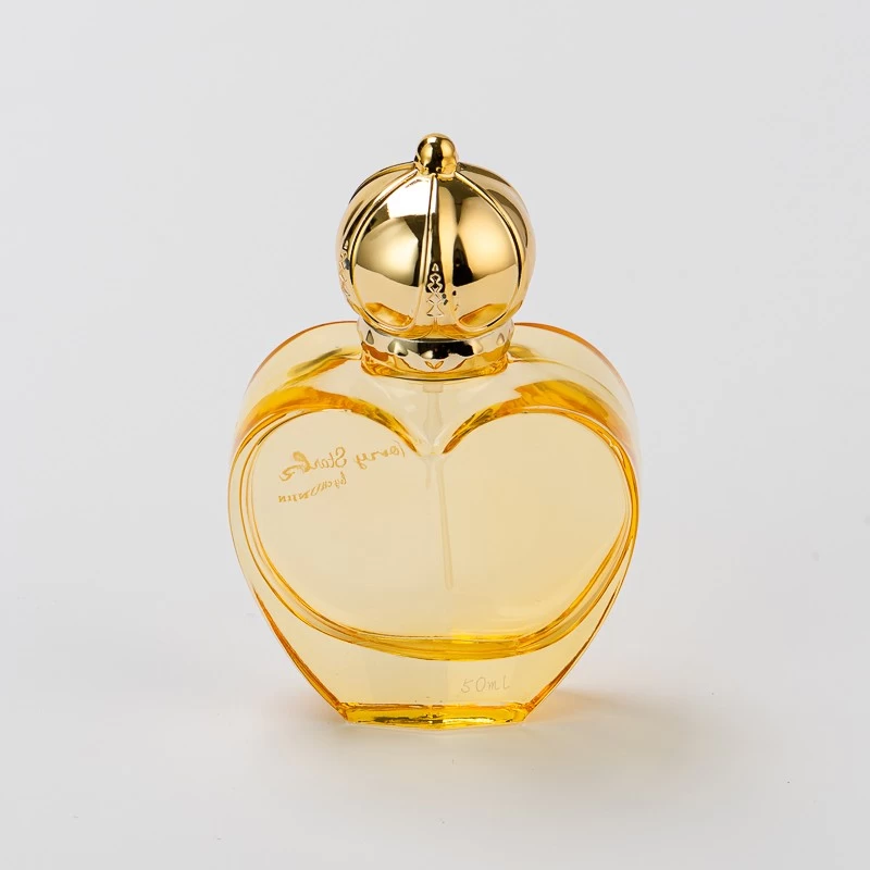 Wholesale 50ml Love shape glass perfume bottle with gold cap