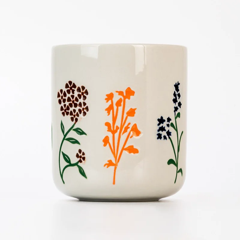 Glossy White Embossed Design with Ceramic Candle Vessels