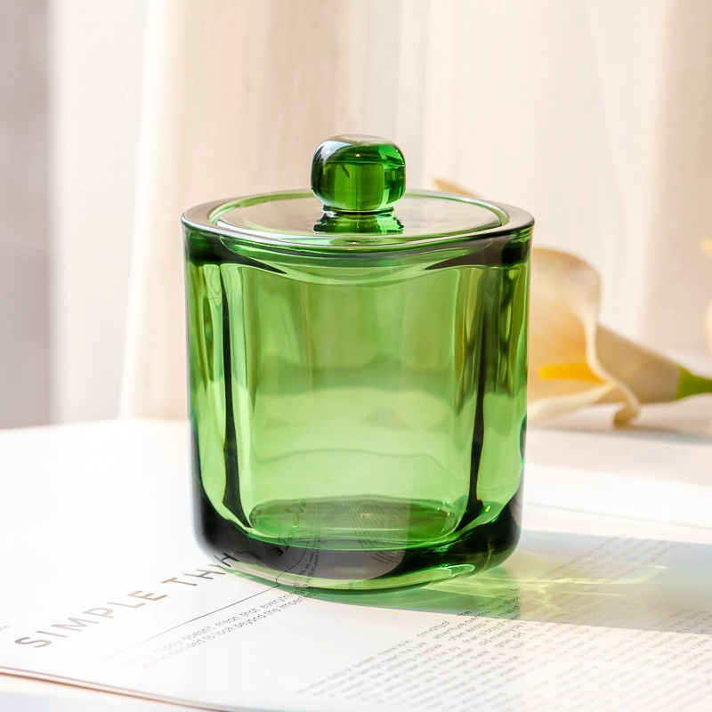 China Elegant Transparent Green Glass Candle Jar with Matching Lid for Home Decor and Luxury Gift Use manufacturer