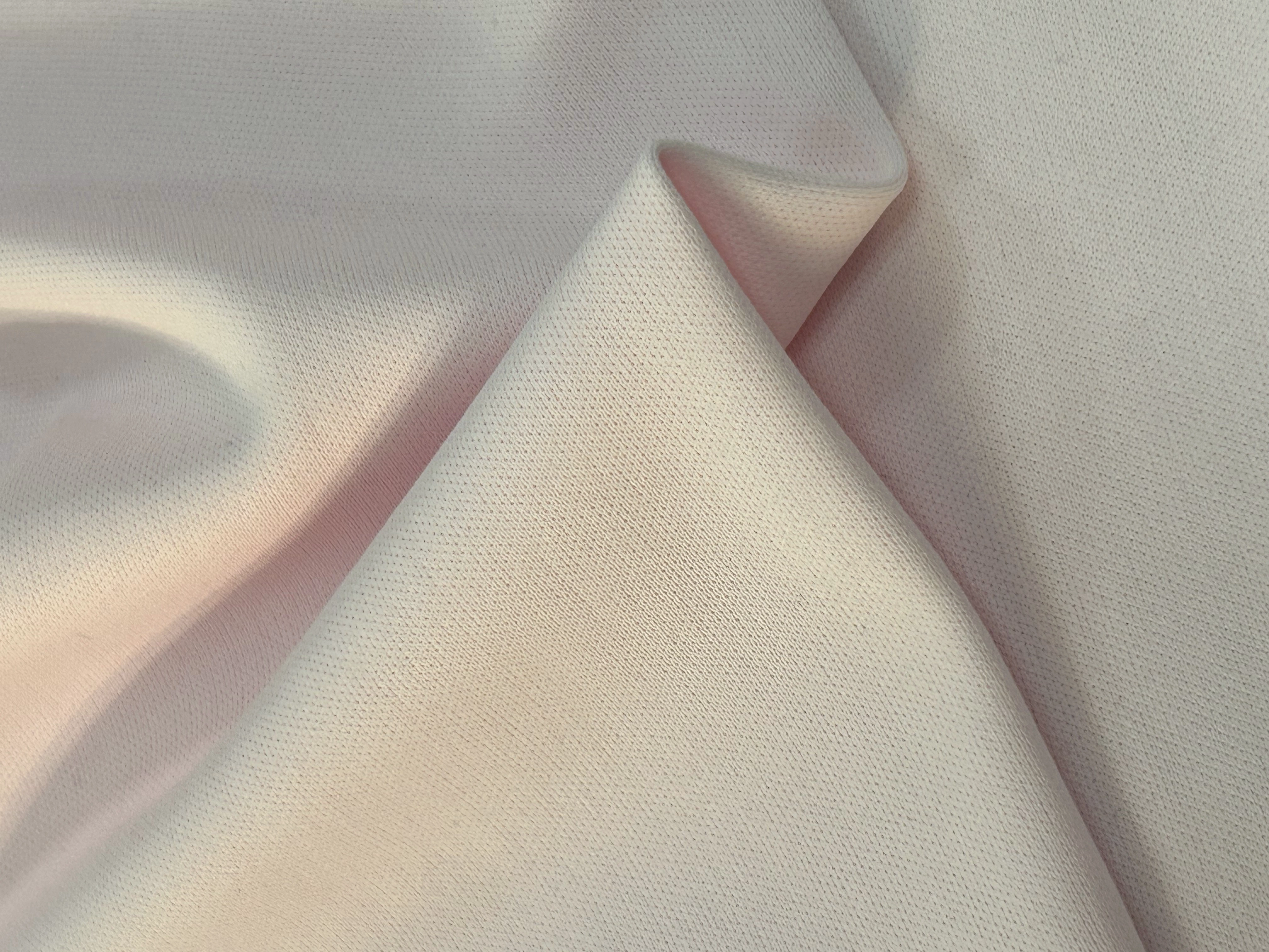 Down Jacket Down-Proof: Functions and Selection Logic of Lining Fabrics