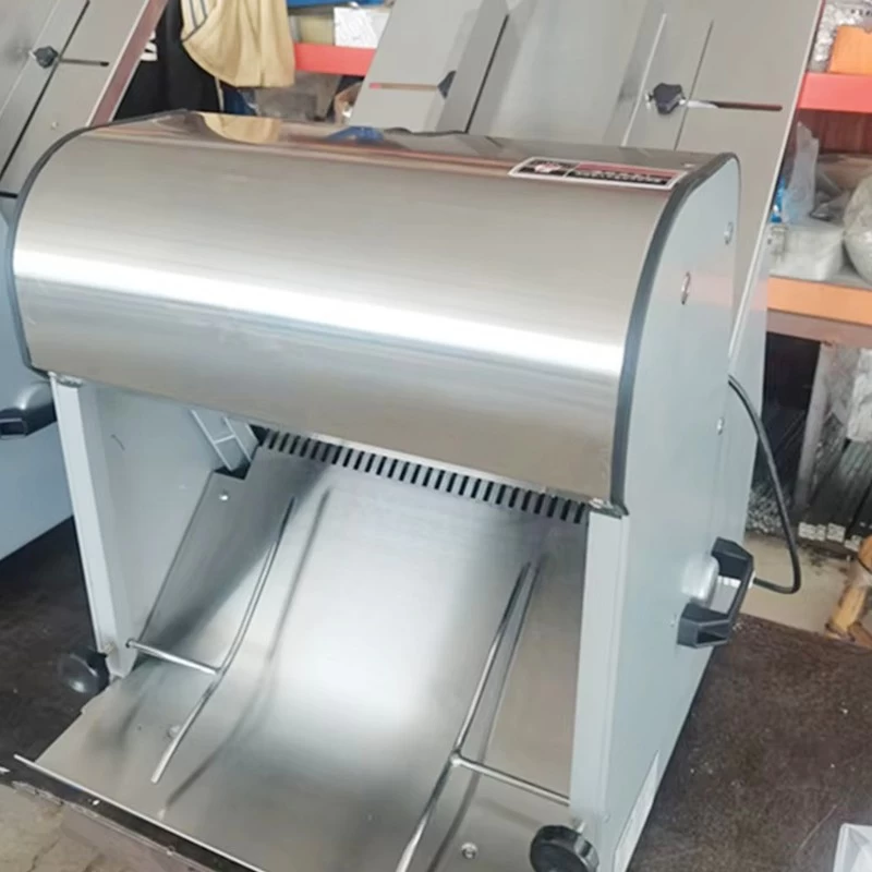 Mesin pemirter roti roti bakar listrik