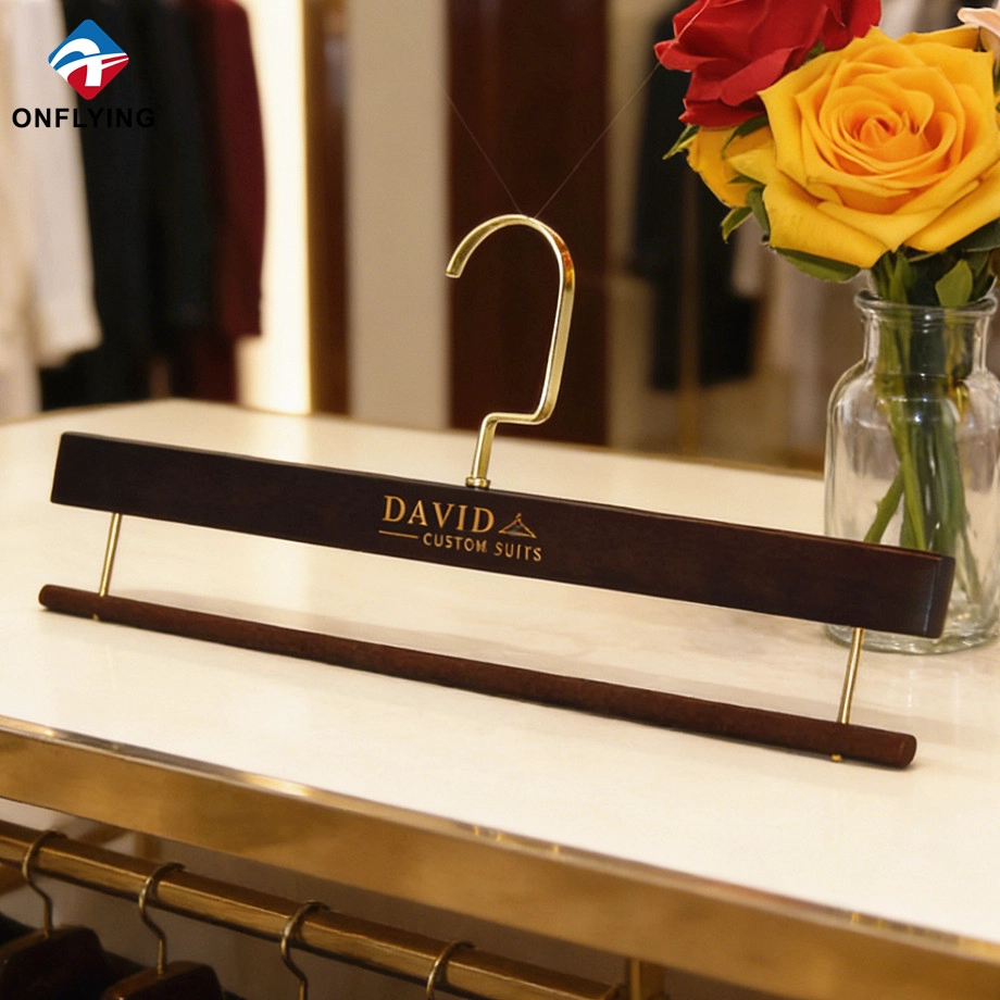 China Premium Custom Brown Lotus Wood Pants Hanger with Velvet bar Supplier China manufacturer