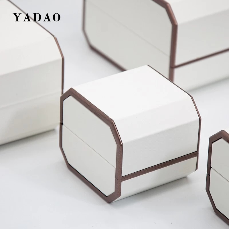 China luxury new style white leather jewelry box Side octagonal flip box manufacturer