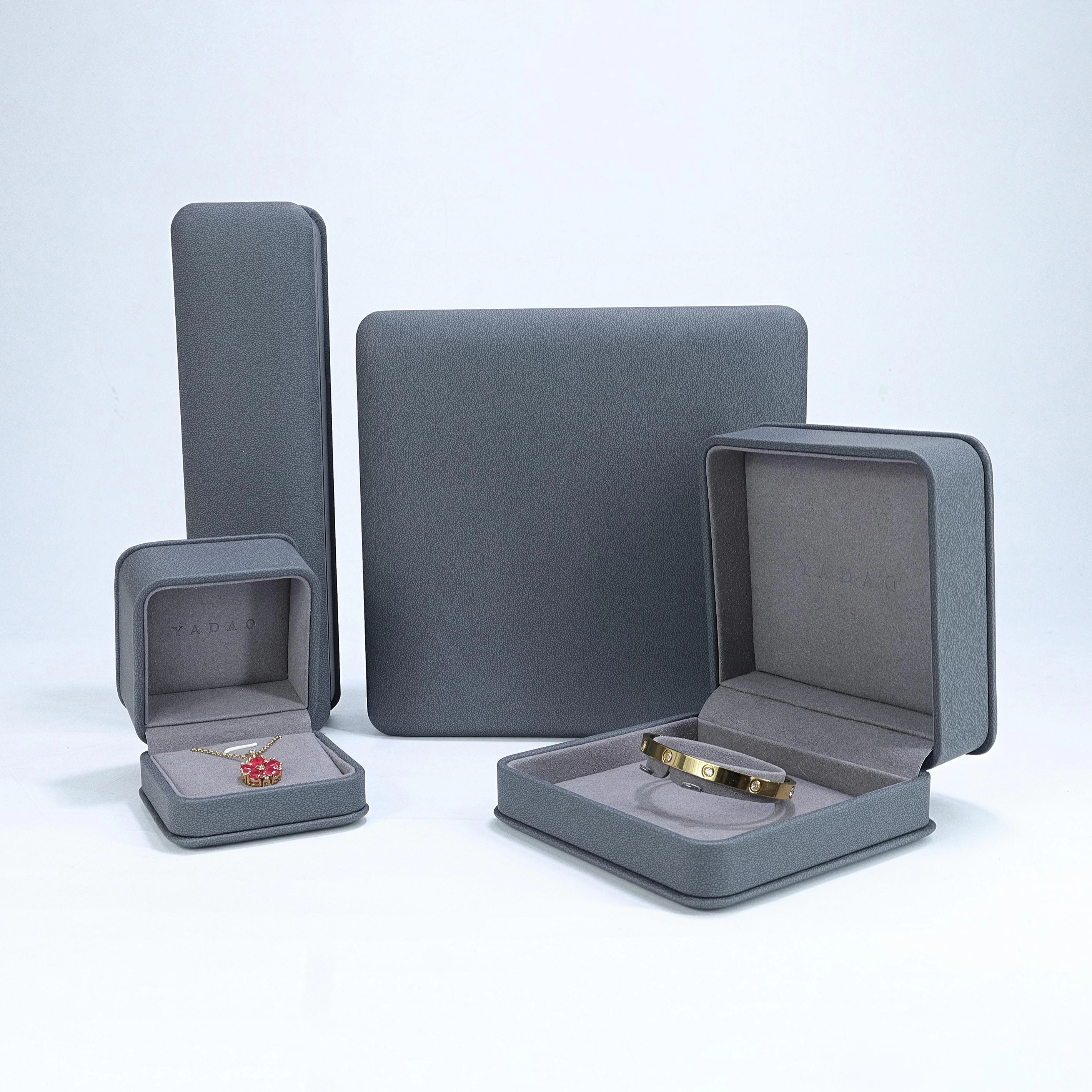 China Custom new style gray leather box set with outer paper box design for jewelry gift packaging manufacturer