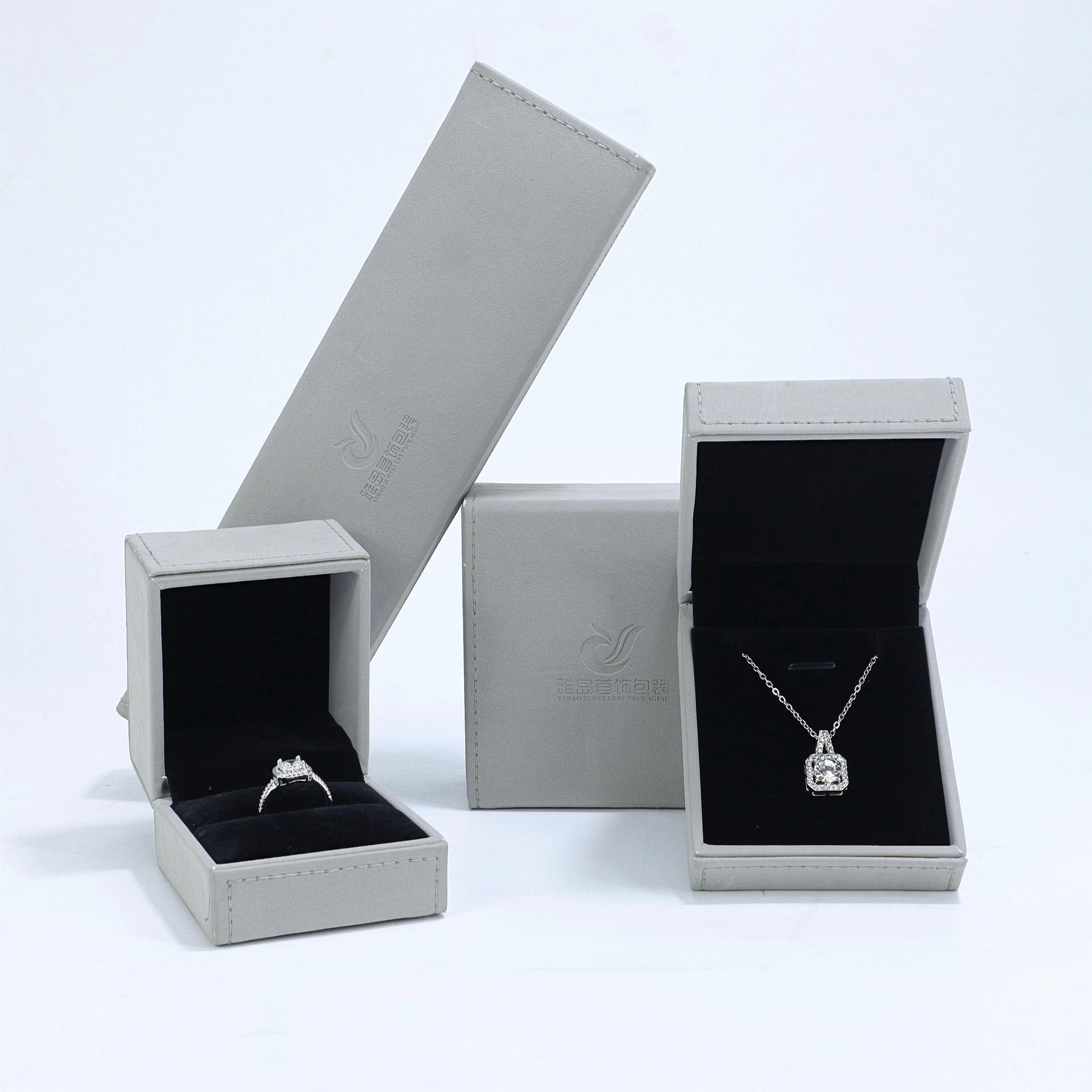 China Luxury Grey Jewelry Box Custom Material Logo Bracelet Bangle Ring Pendant Box manufacturer
