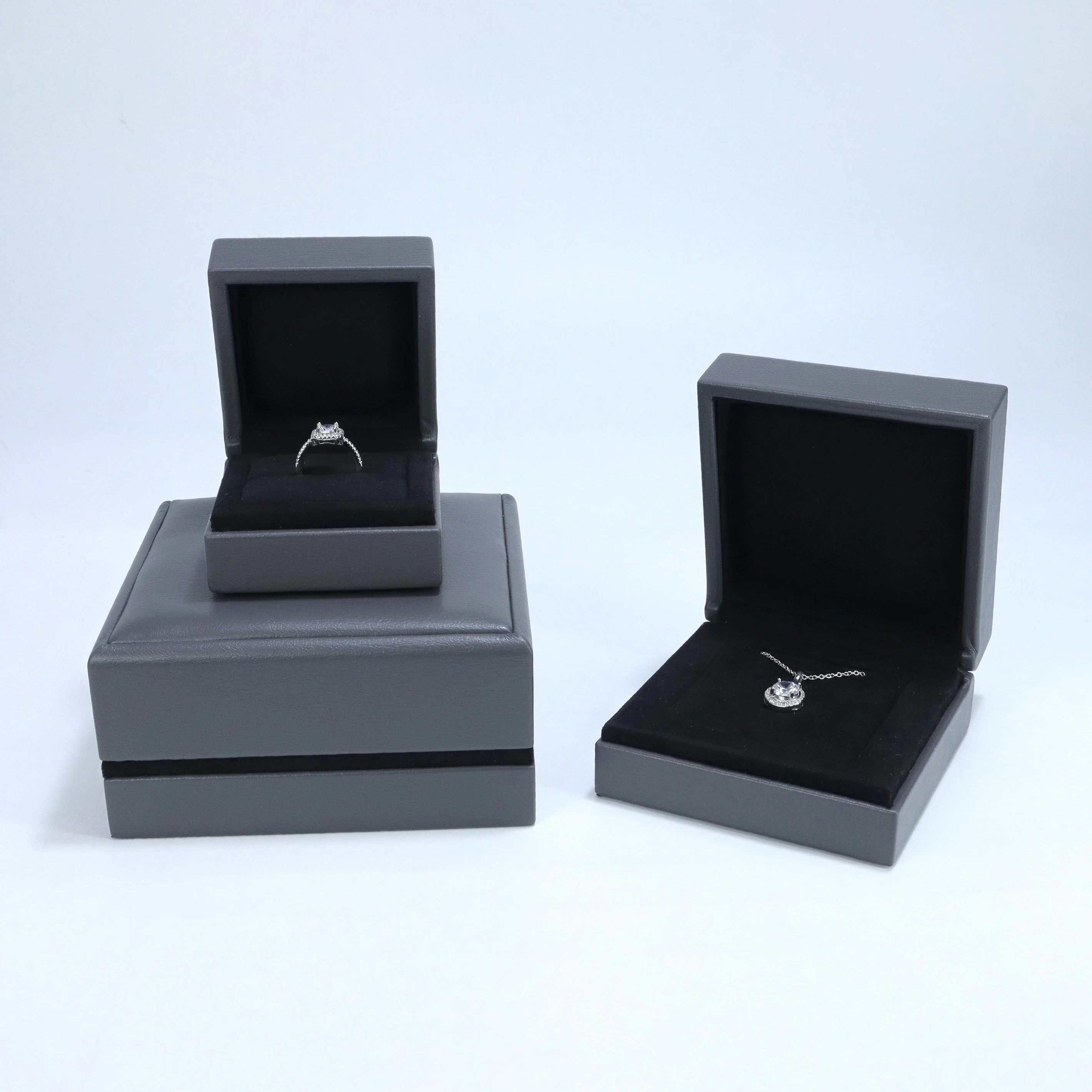 China Pu Leather Jewelry Box Custom Ring Earrings Necklace Box Velvet Insert Pad manufacturer