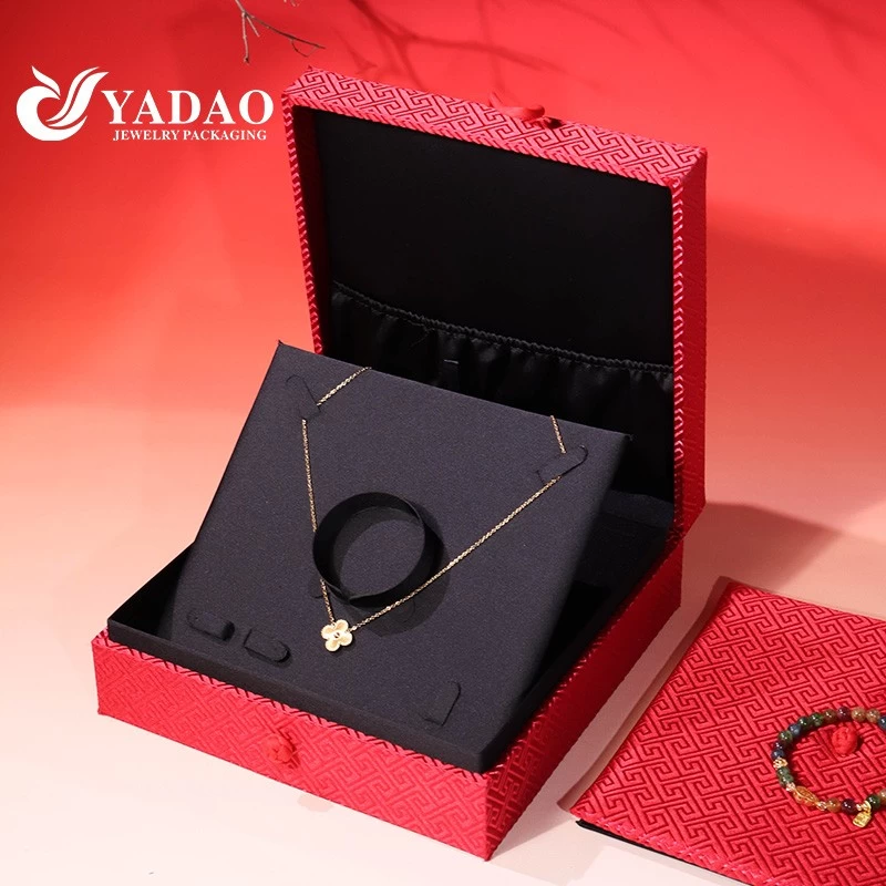Chinese traditional gold jewelry packaging button design flower texture silk box