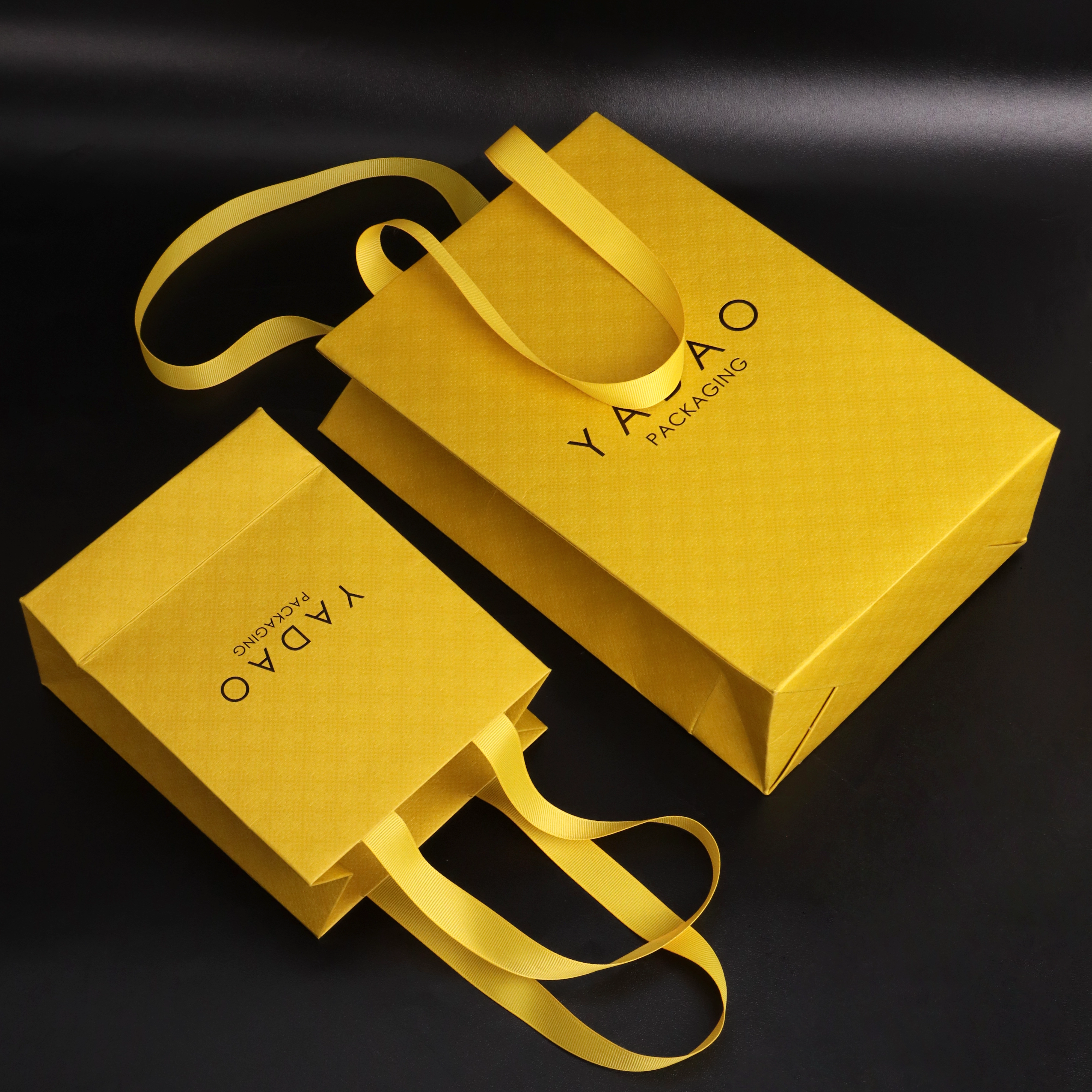 مجموعة أكياس ورقية وشرائط باللون الأصفر الليموني | حلول تغليف المجوهرات المخصصة