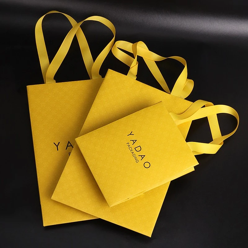 Fancy-stijl boetiekwinkelaccessoire geschenkverpakking papieren lintzak