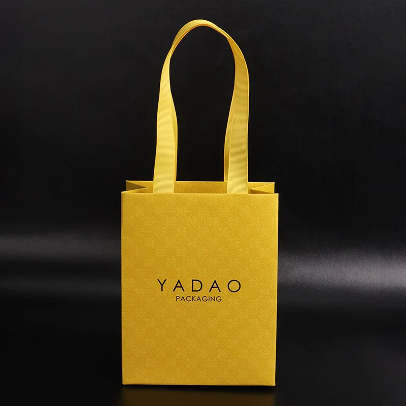 Fancy-stijl boetiekwinkelaccessoire geschenkverpakking papieren lintzak