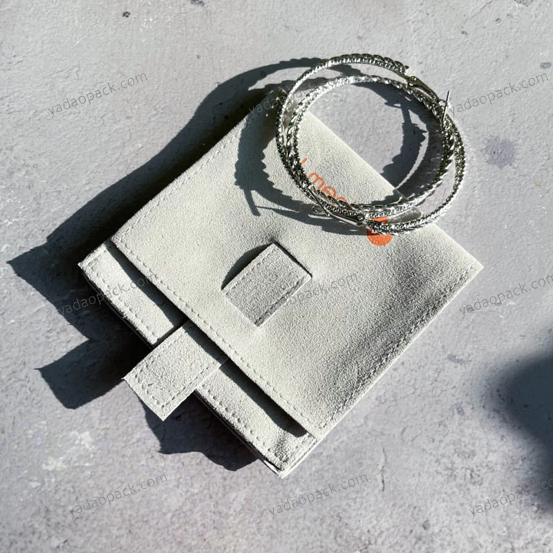 porcelana bolsa de embalaje de joyería con tapa abatible con cierre de cuerda fabricante