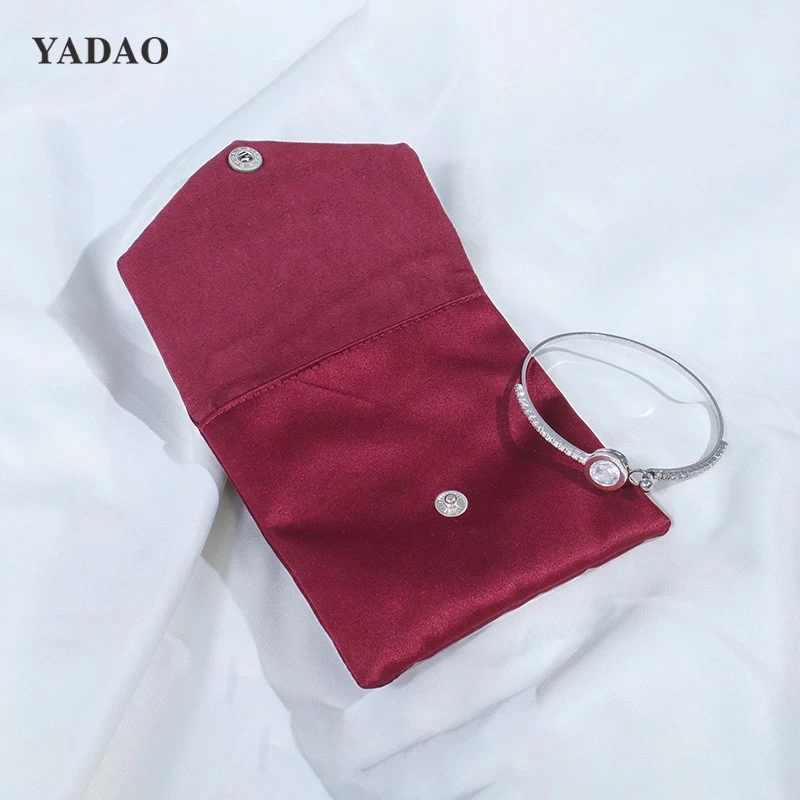 wine red color jewelry packaging pouch finished by satin and suede