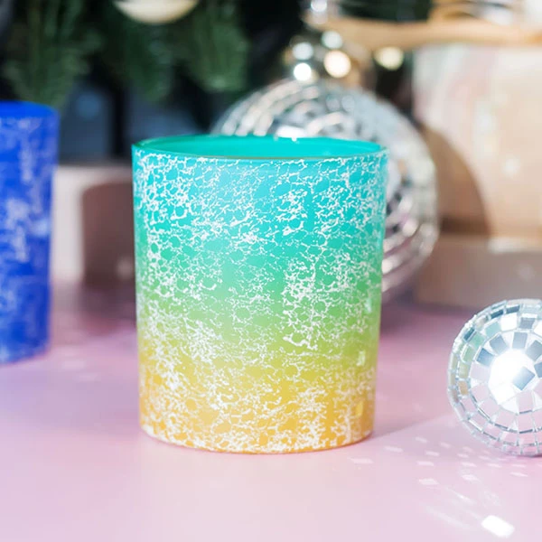 green and yellow candle jar glass