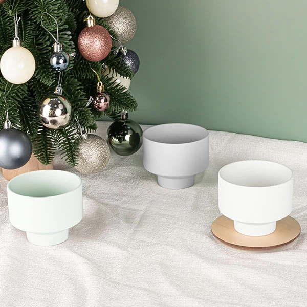 white ceramic candle jar