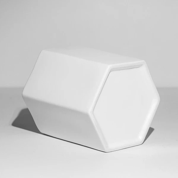 white ceramic candle holders