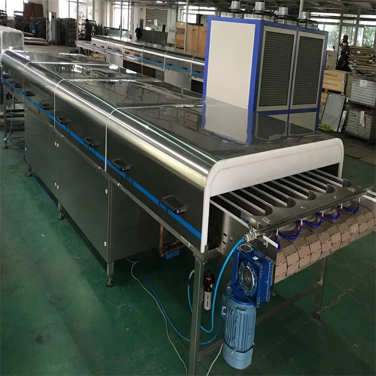 China Máquina de túnel de resfriamento de suco de frutas engarrafadora AMC de alto desempenho e fácil de operar fabricante