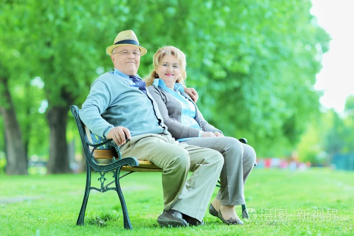 The old man is sitting on the chair