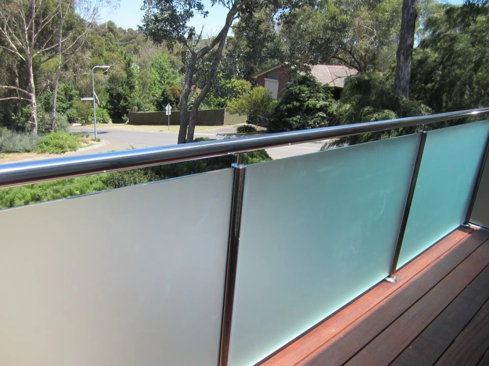 Stainless steel balustrade post with glass clamp