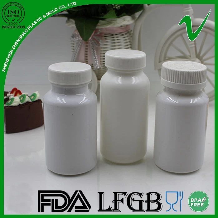 empty plastic medicine bottle with cap