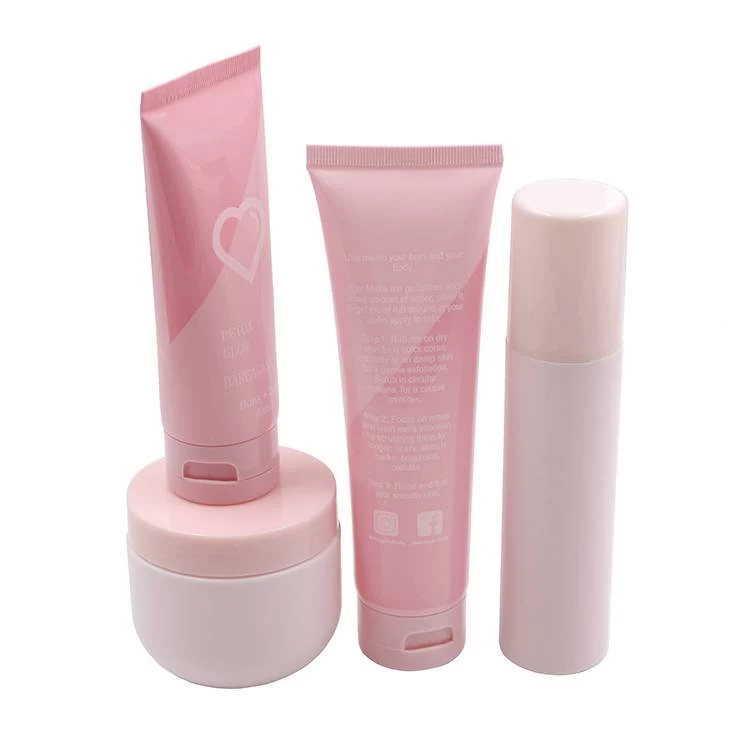 plastic pink cosmetic bottle and jar