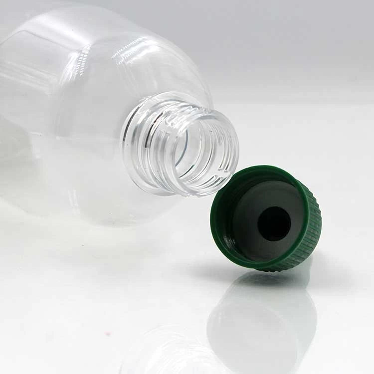empty PET clear plastic sauce bottle