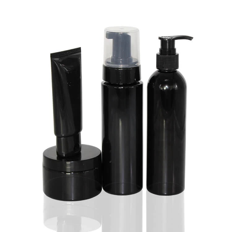 Schwarze kosmetische Plastikflasche & Glas