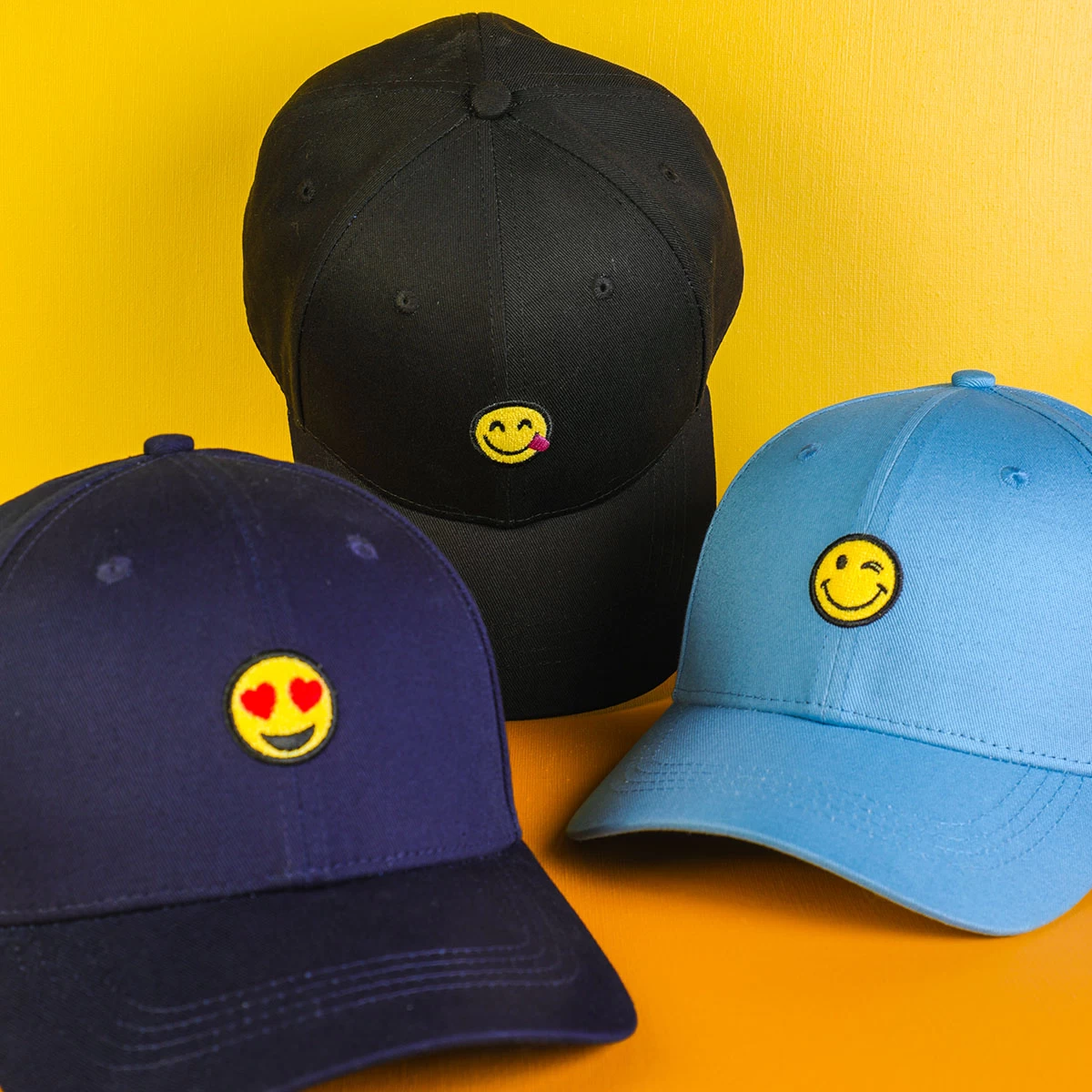 China embroidered smiley face emoji logo sports cotton baseball hats manufacturer