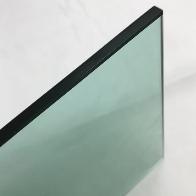 Glass factory in China 8mm light green heat soaked tempered glass prices