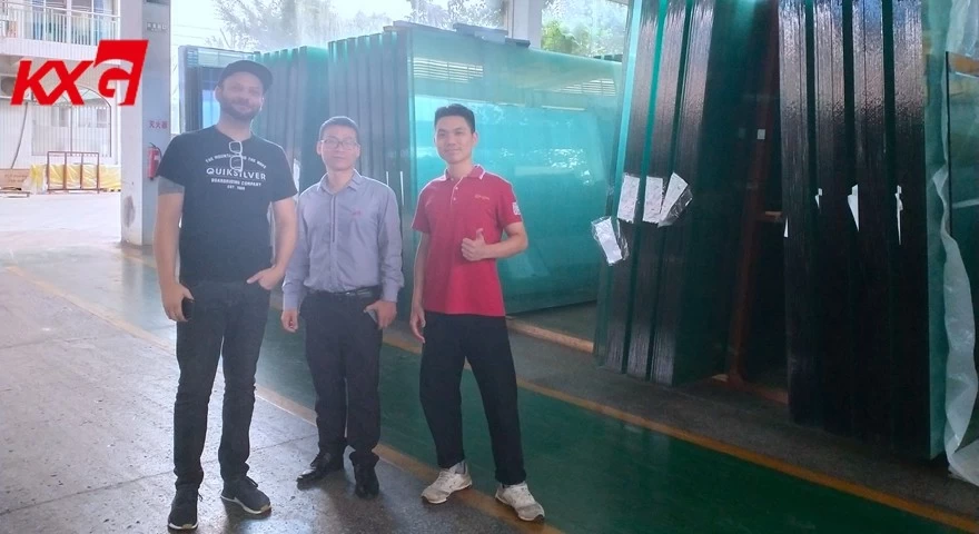 American customer visiting KXG factory float glass warehouse