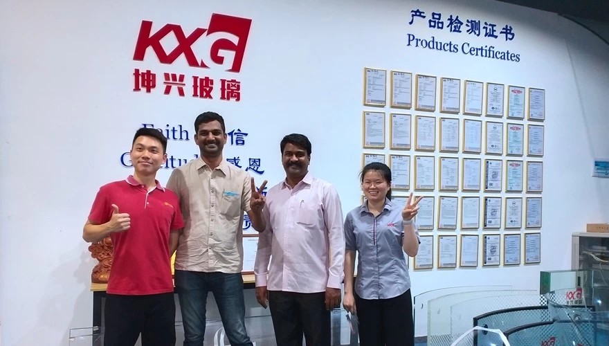 Indian customer from Middle East visiting Kunxing glass factory for building glass