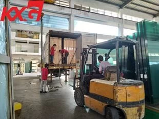 KXG mengeksport cermin berlamina ke Dominika