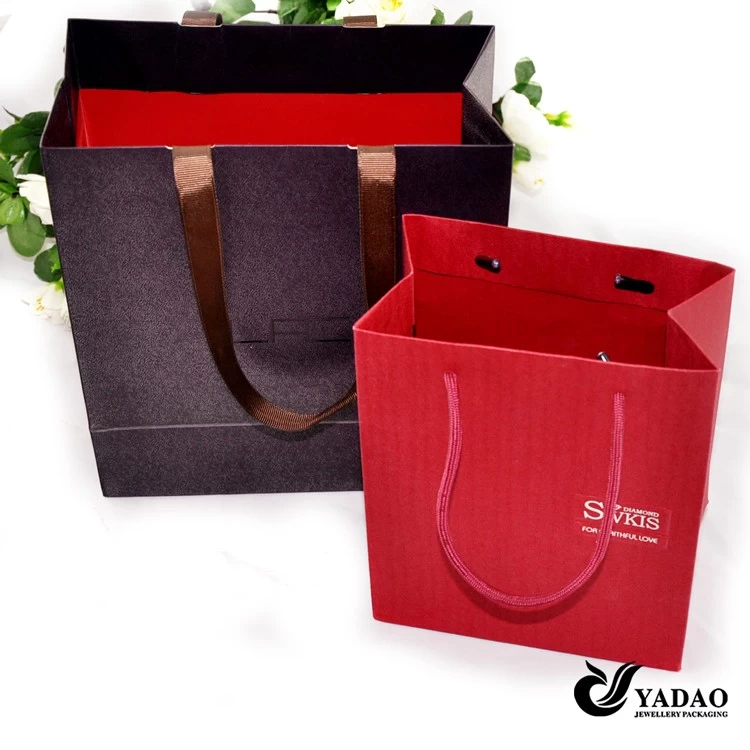 2014 newest paper jewelry packaging bag with print logo for shopping China manufacturer