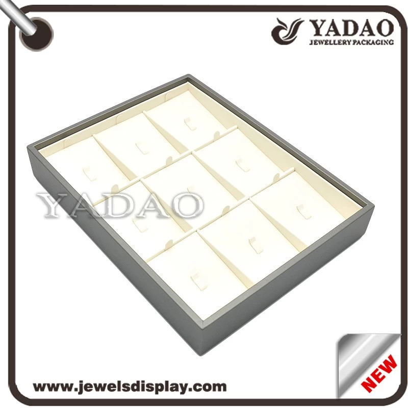 China factory of Newest luxury off white and dark grey PU leather jewelry display holder for shop and tradeshow showcase ring exhibitor trays