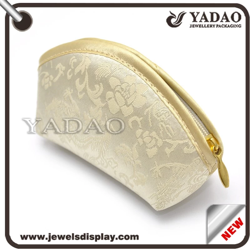 Chinese wholesale cheap small elegant silk jewelry pouch for jewelry packaging with zipper and beautiful pattern