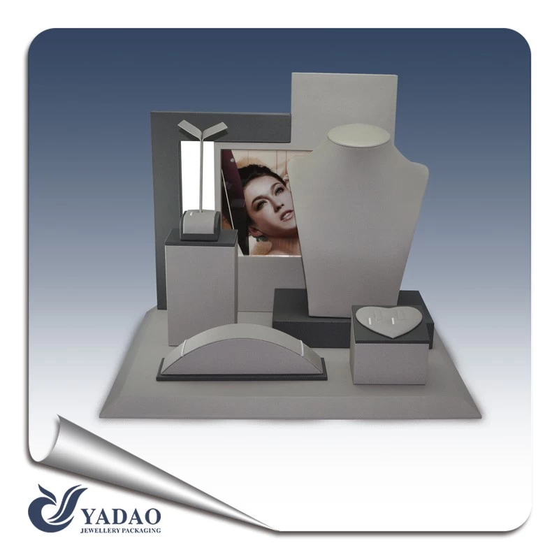 Classic grey leatherette jewelry display set with back board and logo printing suitable for jewelry counter and showcase.
