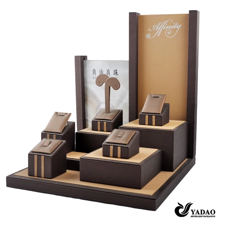 Custom Chocolate PU leather jewelry display prop with MOQ 20 for shop counter showcase and exhibitor used jewelry display cases