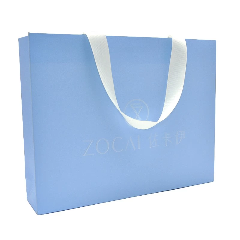 China Custom elegant free logo printing matte paper finish shopping bag for gift and jewelry manufacturer