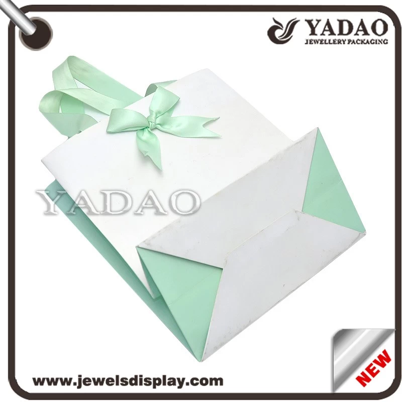 Customed logo printing fashion shopping bags for jewelry display and gift packing strong paper handbag
