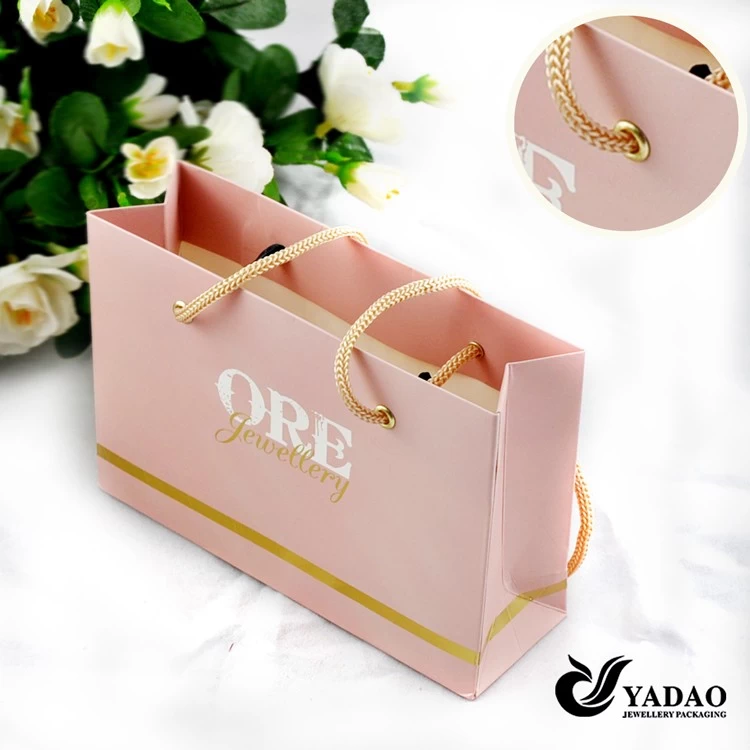 Factory price Pink jewelry shopping bag with gold foil logo and golden color handle China manufacturer