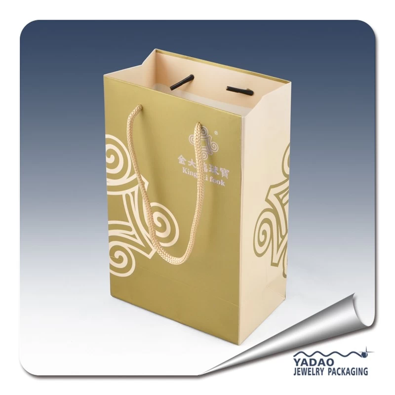 Gold color paper jewelry gift bags with handle and gold color logo Chian supplier