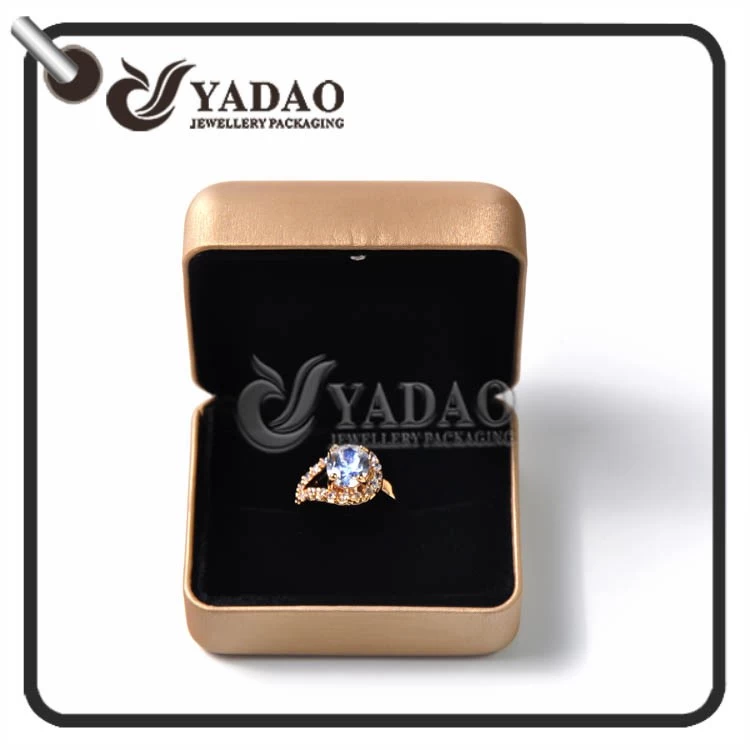 High end golden steel ring box covered with pu leather in stock  suitable for holding gem ring silver ring diamond ring