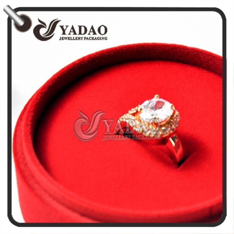 JCK hot selling cute small round velvet ring box with customized color and insert made by Yadao.